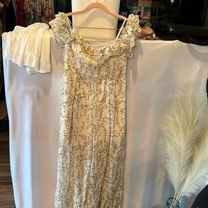 Saints & Secrets formal jumpsuit. Off the shoulder, floral detail, pant slits